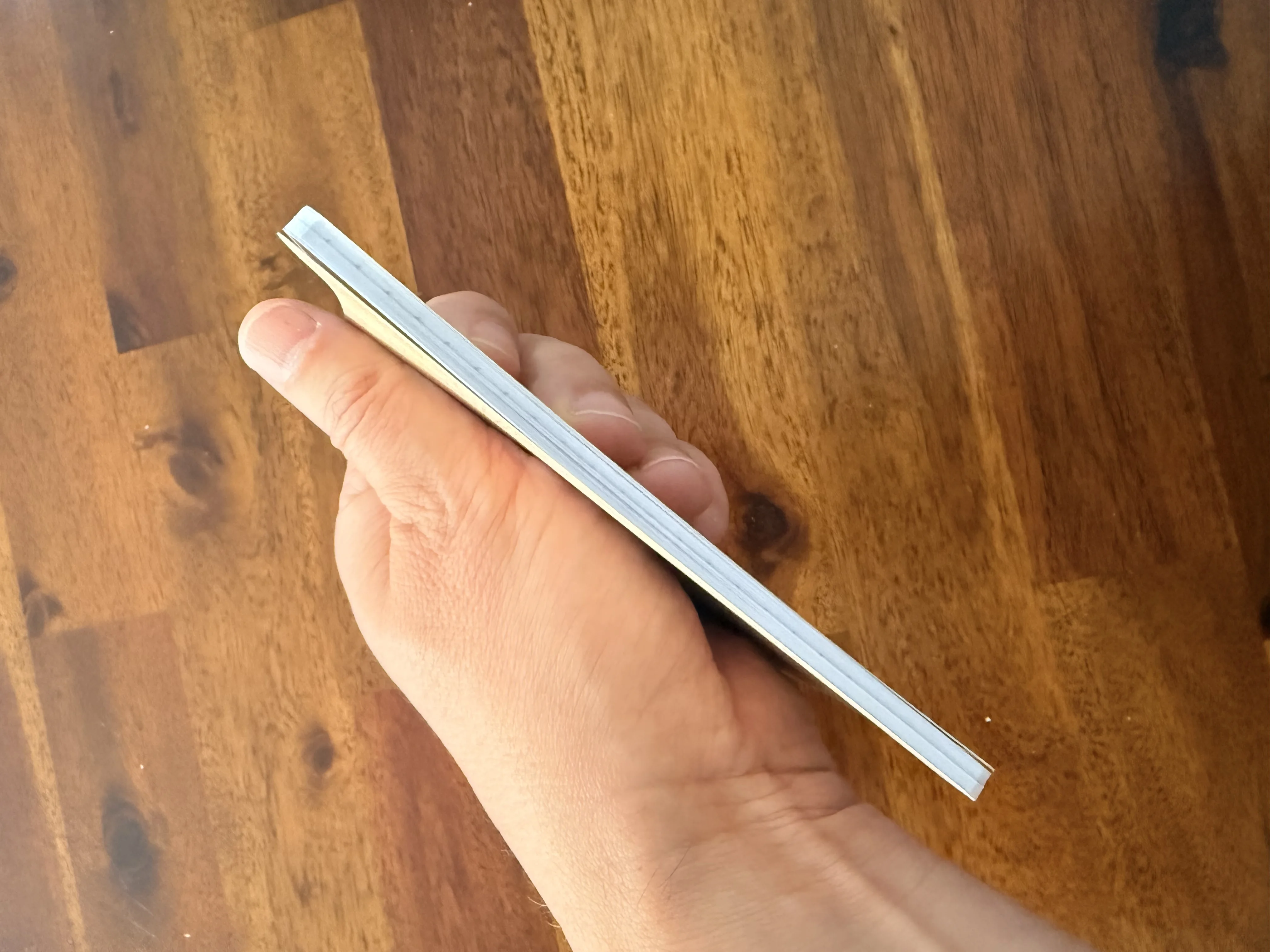 Side view showing the notebook cover and sixty-page block
