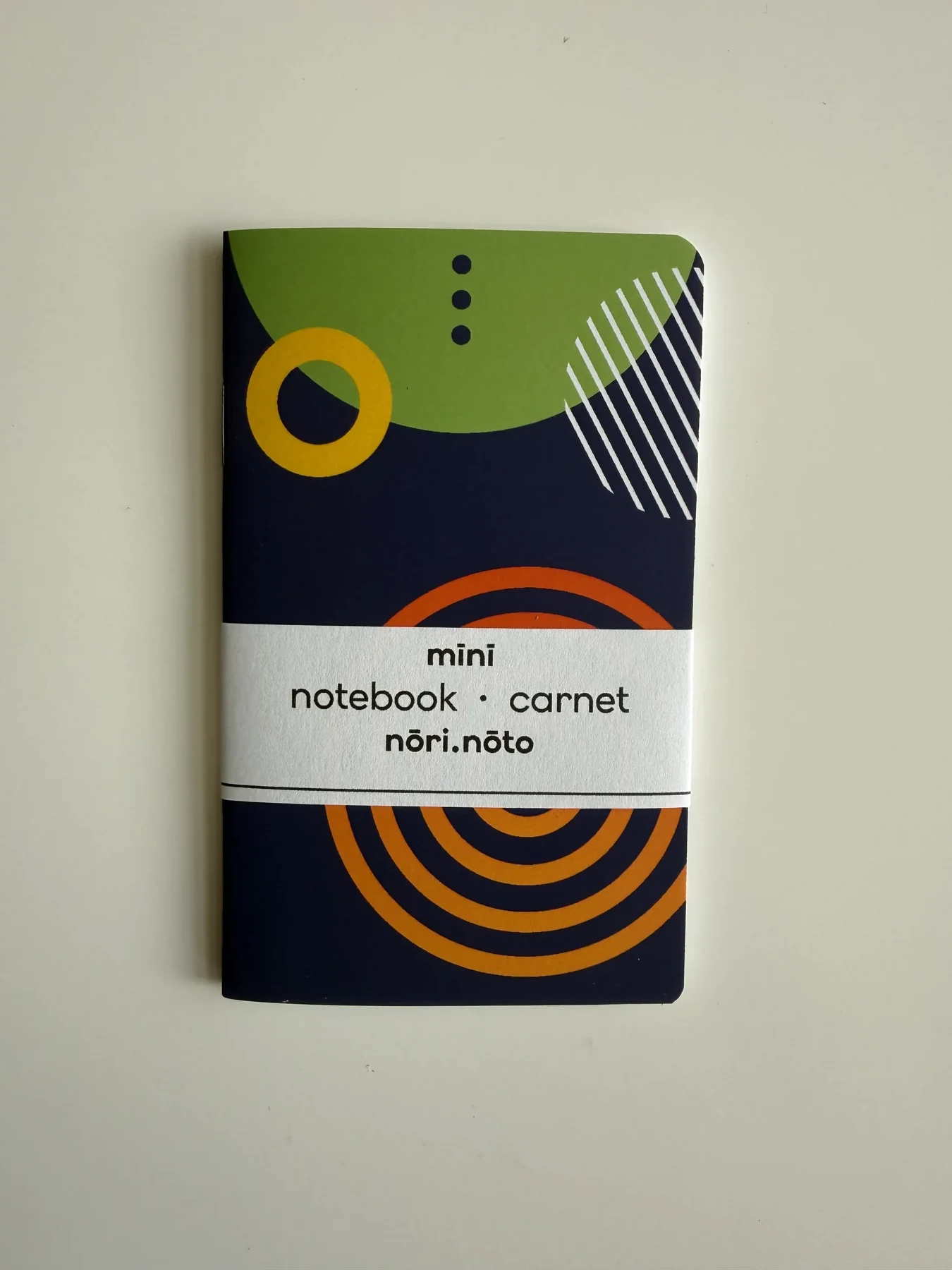 Green and navy Mīnī Fankī notebook with rings and stripes