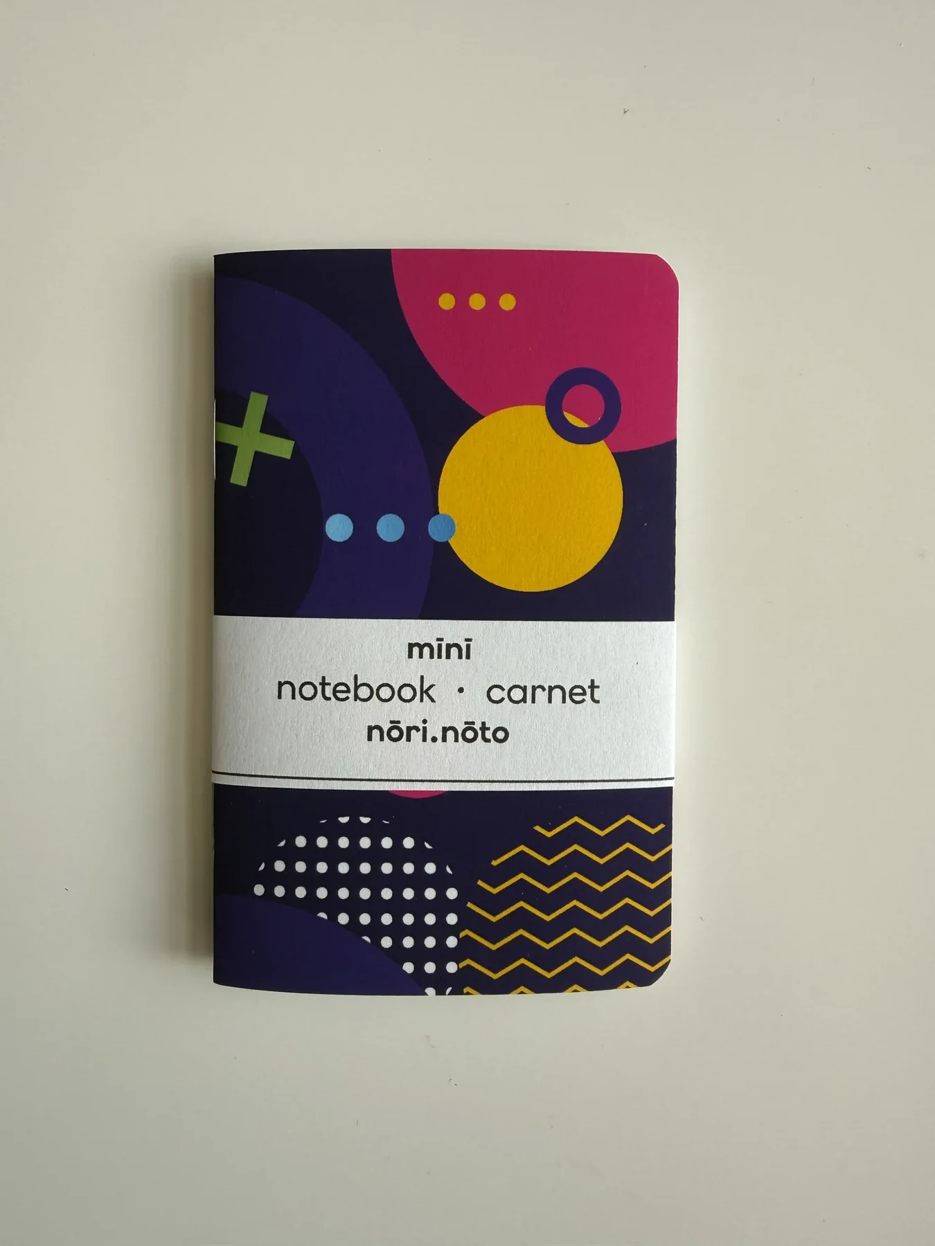 Pink, yellow, and purple Mīnī Fankī notebook