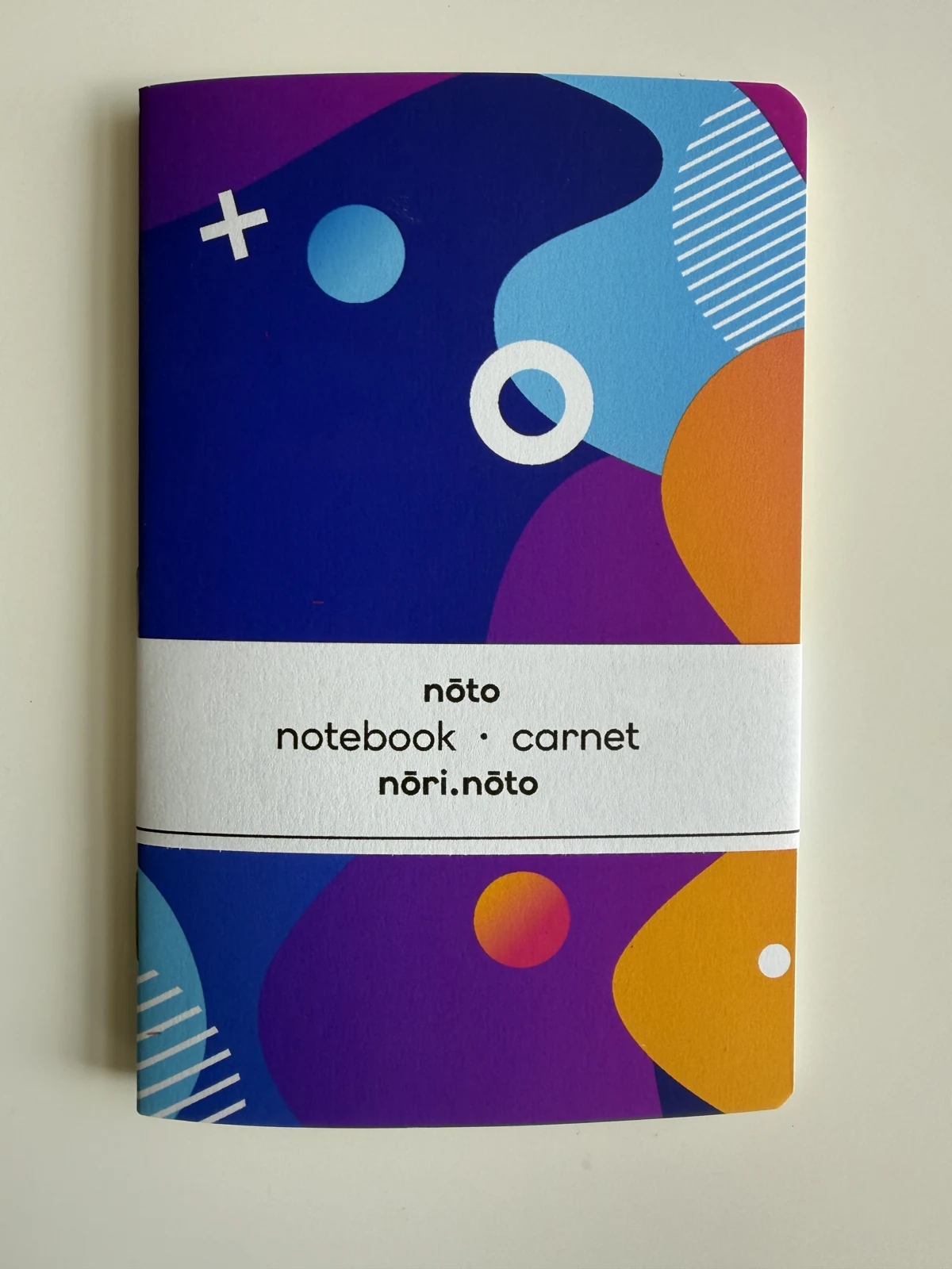 Nōto Fankī notebook with blue, purple, and orange shapes