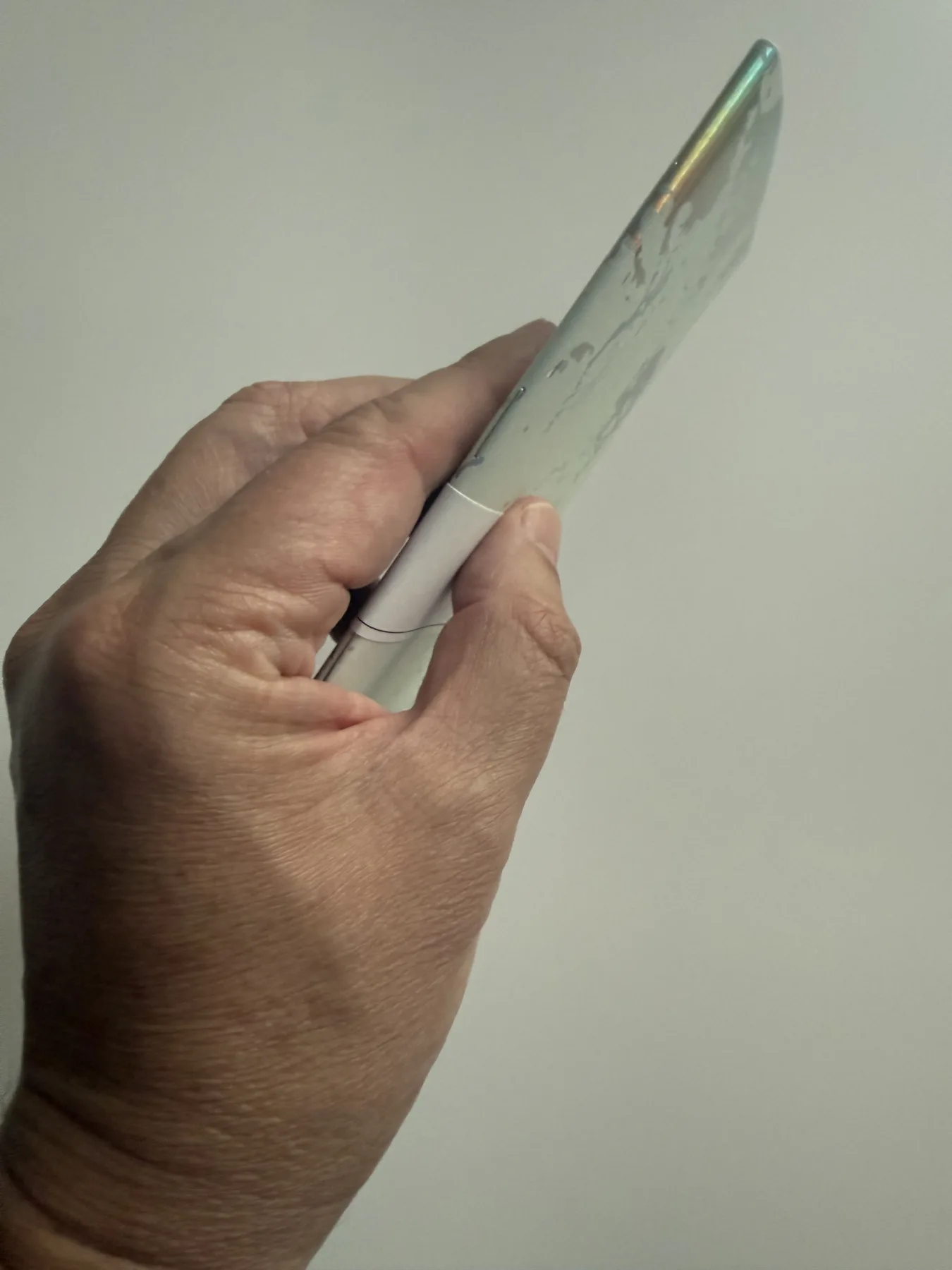 Close view of staples on a creative-paper Nōto notebook